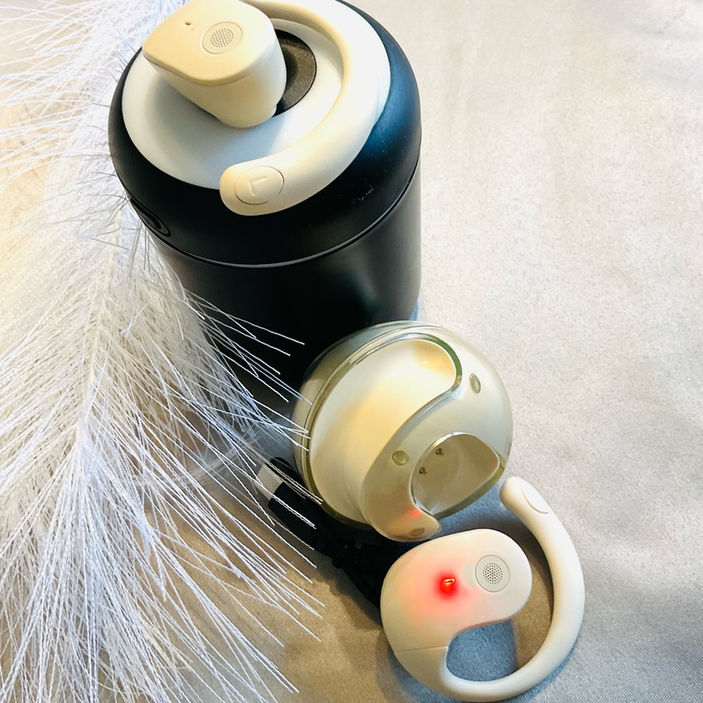 high‑demands” cream/neutral wireless earbuds